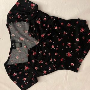 Corset like shirt with floral red patterns